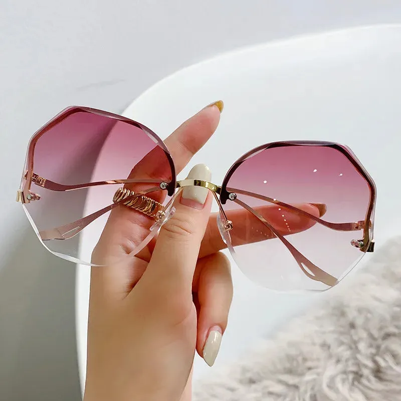 2024 Luxury Round Gradient Metal Curved Ocean Rimless Fashion Sun Eyewear Sunglasses