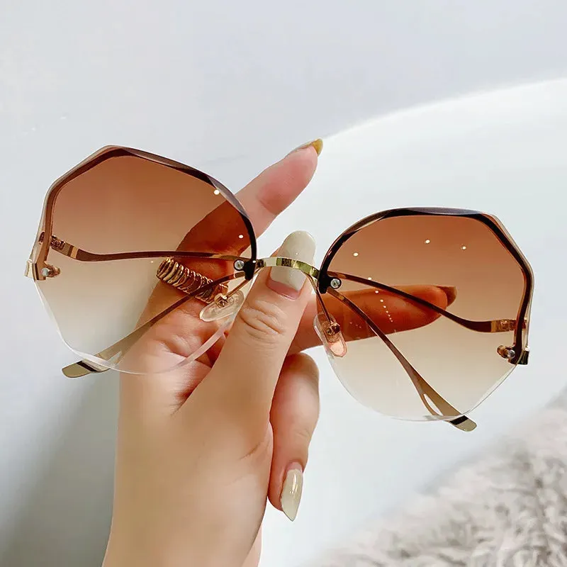 2024 Luxury Round Gradient Metal Curved Ocean Rimless Fashion Sun Eyewear Sunglasses