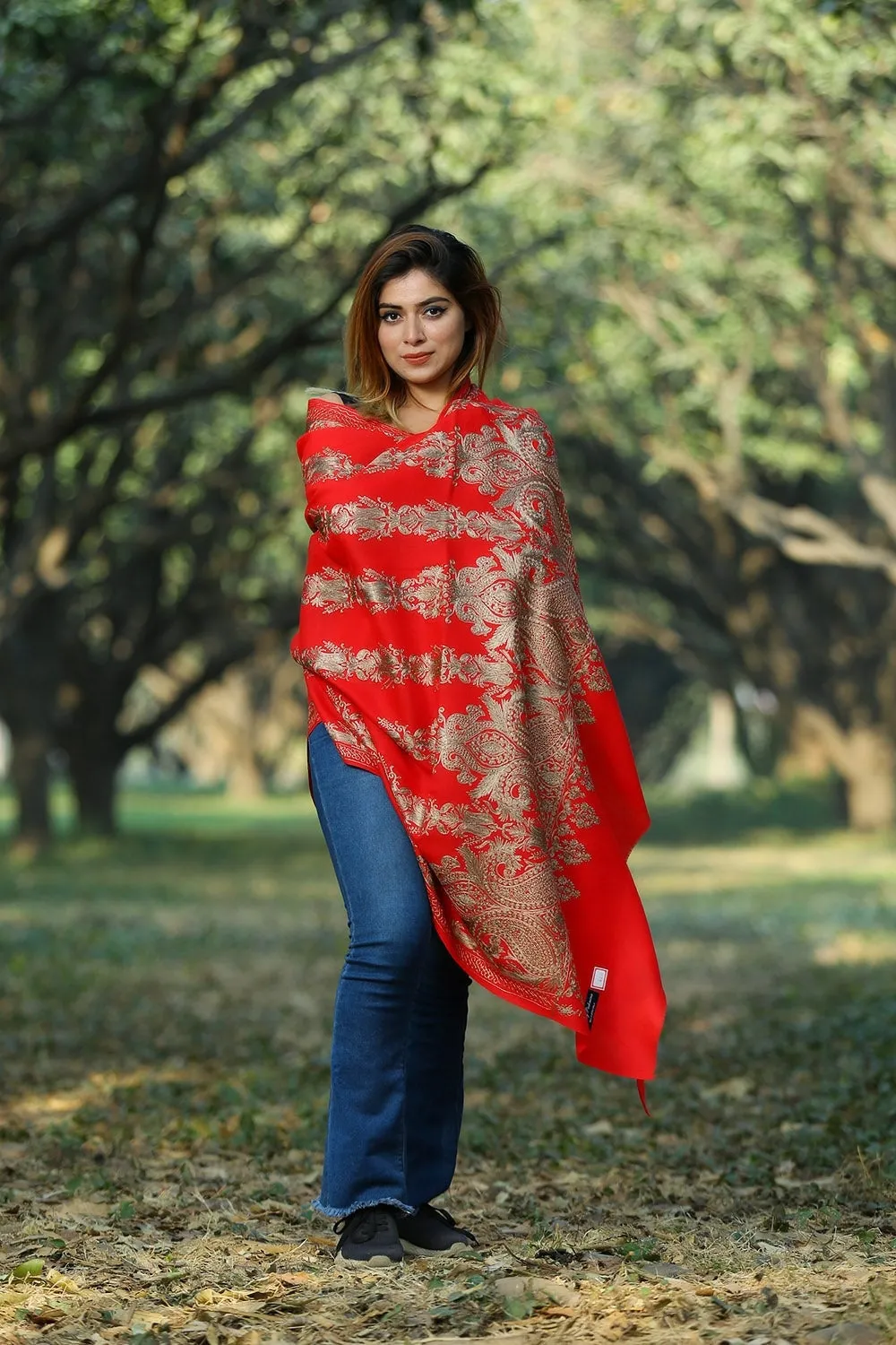 ALLURING RED COLOUR EMBROIDERED SHAWL DEPICTS COURAGE AND RELIGIOUS FERVOR